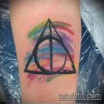 fénykép a halálos ereklyék tetoválásáról 731. sz.