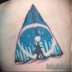 fénykép a halálos ereklyék tetoválásáról, 519. sz.