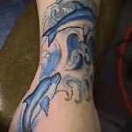 delfintetoválás fotó # 870 - a minta egyedi változata, amely könnyen használható a delfintetoválás átalakítására és felhelyezésére a csuklóra fényképként