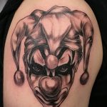 fotó a joker tetoválásról # 259 - a minta egyedi változata, amely könnyen használható változtatásra és alkalmazásra joker tetoválás mosolyaként