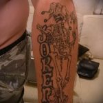 fotó a 108. számú joker tetoválásról - a minta érdekes változata, amely jól használható a női joker tetoválás átalakítására és alkalmazására