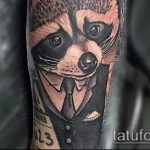 787 -es mosómedve -tetoválás fotója - a minta egyedi változata, amely sikeresen használható változtatásra és alkalmazásra, mint egy mosómedve -tetoválás képe a borján
