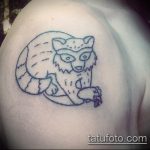 fotó a mosómedve tetoválásról, 104. szám - a minta érdekes változata, amely könnyen használható feldolgozásra és alkalmazásra, mint egy mosómedve tetoválás képe a borján