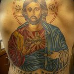 Fénykép Jézus Krisztus tetoválásról, 825. szám - a minta egyedi változata, amely sikeresen felhasználható a Jézus Krisztus csuklóján lévő tetoválás átalakítására és alkalmazására