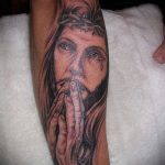 Fénykép Jézus Krisztus tetoválásról, 959. sz. - a rajz hűvös változata, amely jól használható a feldolgozásra és Jézus Krisztus tetoválásaként történő alkalmazására az alkaron