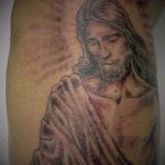 Az 505 -ös számú Jézus Krisztus -tetoválás fotója - a minta egyedi változata, amely sikeresen használható módosítására és alkalmazására, mint Jézus Krisztus tetoválása a csuklón