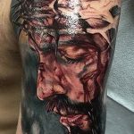 Fotó a Jézus Krisztus tetoválásról, 781. szám - a rajz hűvös változata, amely jól használható a feldolgozásra és a tetoválásra Jézus Krisztus csuklóján