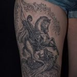 Tetoválás Győztes György - egy tetoválás ikonja egy lány lábán