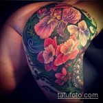 A kész írisz tetoválás klassz példája - a rajz alkalmas írisz tetováláshoz a hát alsó részén