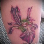 A meglévő írisz tetoválás klassz példája - a rajz alkalmas írisz tetováláshoz a lapockán