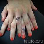 űr tetoválás a csuklón - fotó a kész tetoválásról 7140 tatufoto.ru