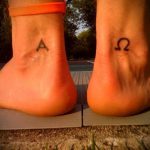 omega tetoválás No. 518 - a minta exkluzív változata, amely jól használható változtatásra és tetoválás omegaként történő alkalmazására