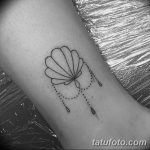 fotó egy kagylótetoválásról, kelt 2017.10.07. №198 - tetoválóhéj -