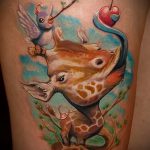 Fajny przykład wytatuowanej żyrafy - rysunek nadaje się do tatuażu żyrafy na przedramieniu