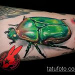 A bogár tetoválás remek példája - a rajz alkalmas a bogár tetoválására a karon