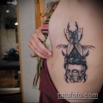 A bogár tetoválás egyedülálló példája - a rajz alkalmas az orrszarvú bogár tetoválására