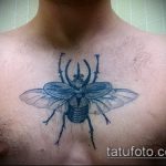 A bogár tetoválás remek példája - a rajz alkalmas a bogár tetoválására a karon