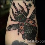 Egy érdekes példa a kész bogár tetoválásra - a rajz alkalmas a kar bogár tetoválására