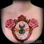 Egy egyedülálló példa egy bogár tetoválásra - a rajz alkalmas egy kereszttel ellátott bogár tetováláshoz