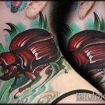 A bogár tetoválás remek példája - a rajz alkalmas a bogár tetoválására a karon