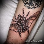 A tetovált bogár egyedi változata - a rajz alkalmas az orrszarvú bogár tetoválására