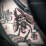 Eredeti példa egy bogár tetoválásra - a rajz alkalmas egy kereszttel ellátott bogár tetováláshoz