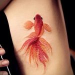 A meglévő aranyhal tetoválás remek példája - a rajz alkalmas egy horgolt aranyhal tetoválásra