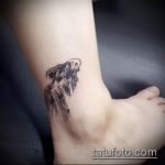 Egy egyedülálló példa egy aranyhal tetoválásra - a rajz alkalmas az aranyhal tetoválására az oldalán