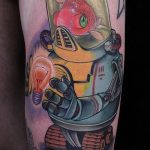 A kivitelezett aranyhal tetoválás hűvös változata - a rajz alkalmas egy aranyhal tetoválásra a bokán