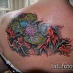 A kész aranyhal tetoválás klassz példája - a rajz alkalmas aranyhal tetoválásra a hátán