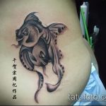 Egy érdekes példa egy aranyhal tetoválásra - a rajz alkalmas egy aranyhal tetoválásra koronával