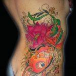 Érdekes példa egy meglévő aranyhal tetoválásra - a rajz alkalmas egy aranyhal tetoválásra egy lány számára