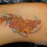 A kész aranyhal tetoválás érdekes változata - a rajz alkalmas aranyhal tetoválásra az oldalán