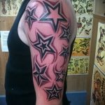 A könyökön lévő csillag tetoválás tesztverziója - a rajz alkalmas a könyökön lévő csillag tetováláshoz a sajtó számára