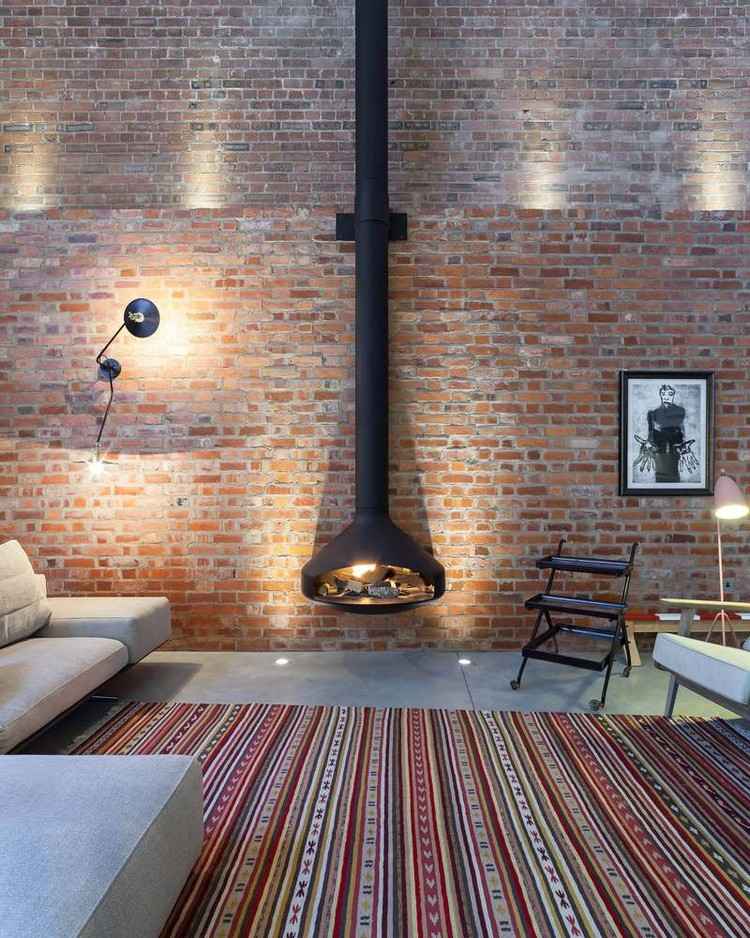 otvorený obývacia izba tehlová stena voľne stojaci krbový koberec