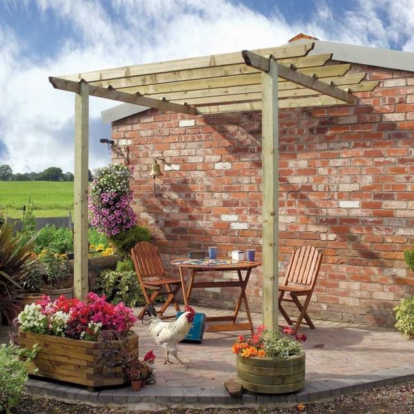 Materiály terasa strecha pergola drevo tehlová stena Materiály terasa na streche pergola drevený stôl tehlová stena