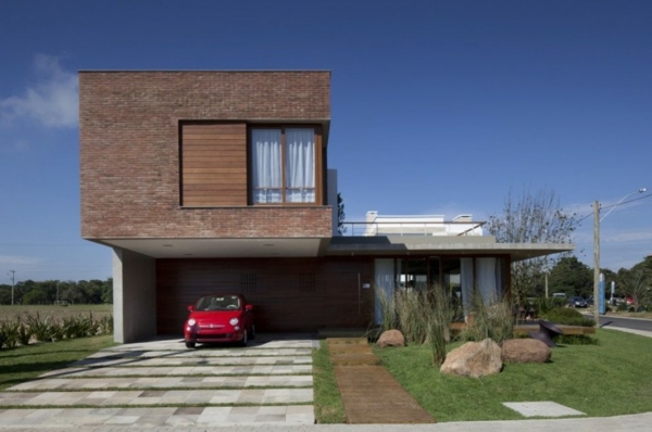 Garáž z tehlovej a sklenej architektúry Tehlová a sklenená architektúra - garáž od Martima Hausa