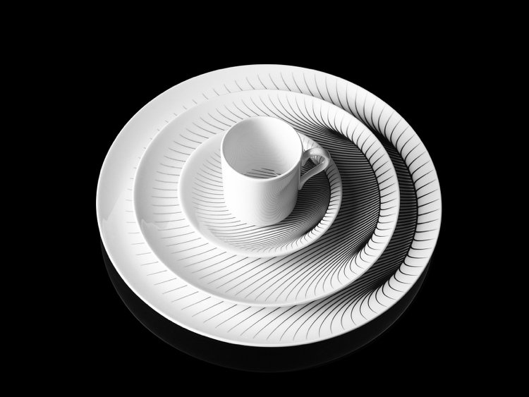 čiernobiela štruktúra vytvára optický klam riad-sada-zaha-hadid-porcelán-biely-vzor-3d-efekt