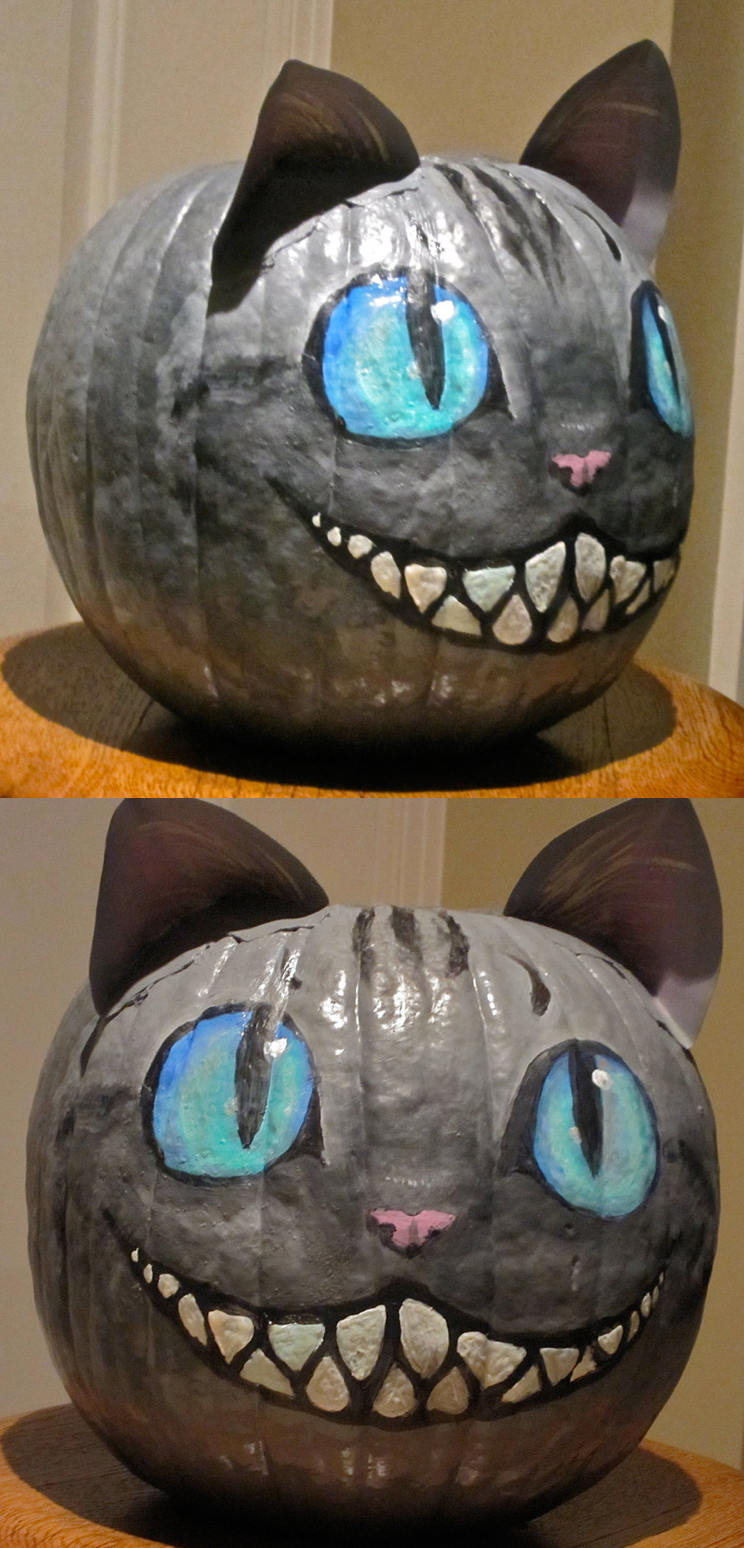 Cheshire cat Halloween tekvicová farba tváre veľké modré oči