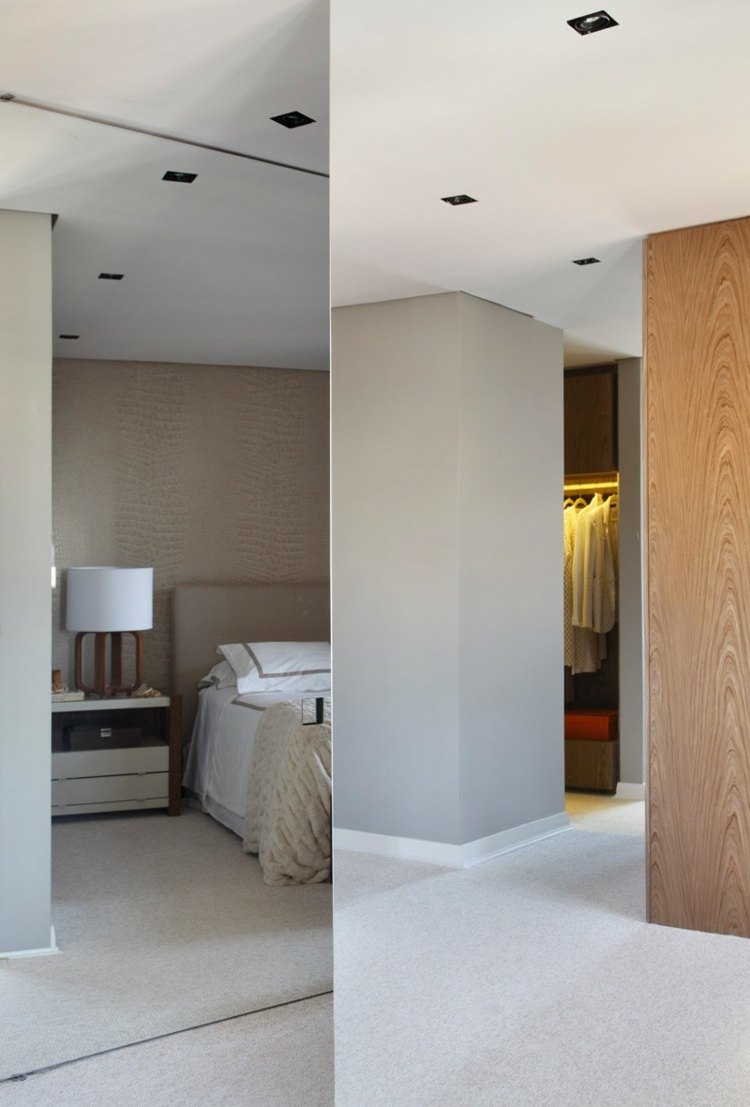 Dom má v spálni zrkadlo od podlahy po strop interiér domu biela spálňa so zrkadlom z tmavého dreva