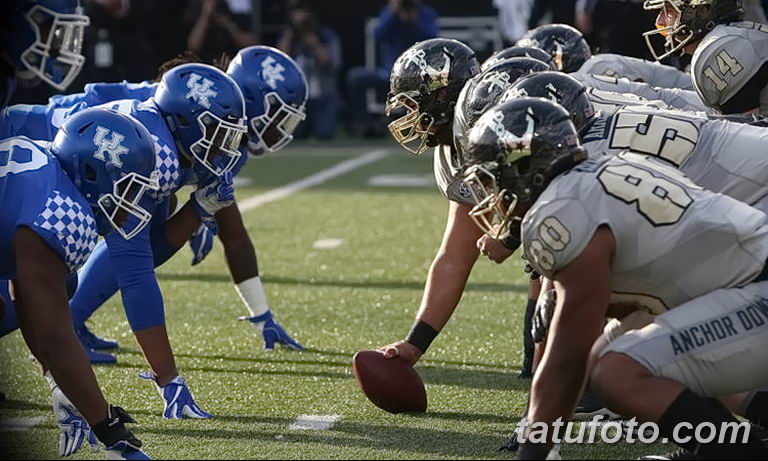 Igrač američkog nogometa iz Kentuckyja tetovira se s divljom mačkom - fotografija 0
