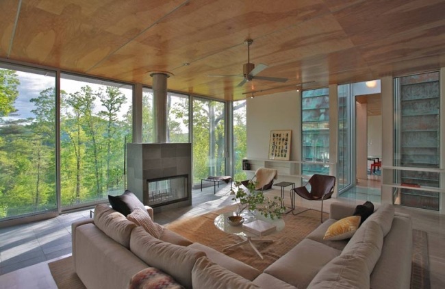 Obývacia sklenená fasáda obývacia izba-otvorený interiérový dizajn-dom Bruneel vo svahu