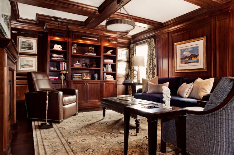 Kožené kreslo v obývacej izbe v tradičnom anglickom štýle Kožené kreslo-hnedá-obývačka-nápady na bývanie-kilim-drevený stôl