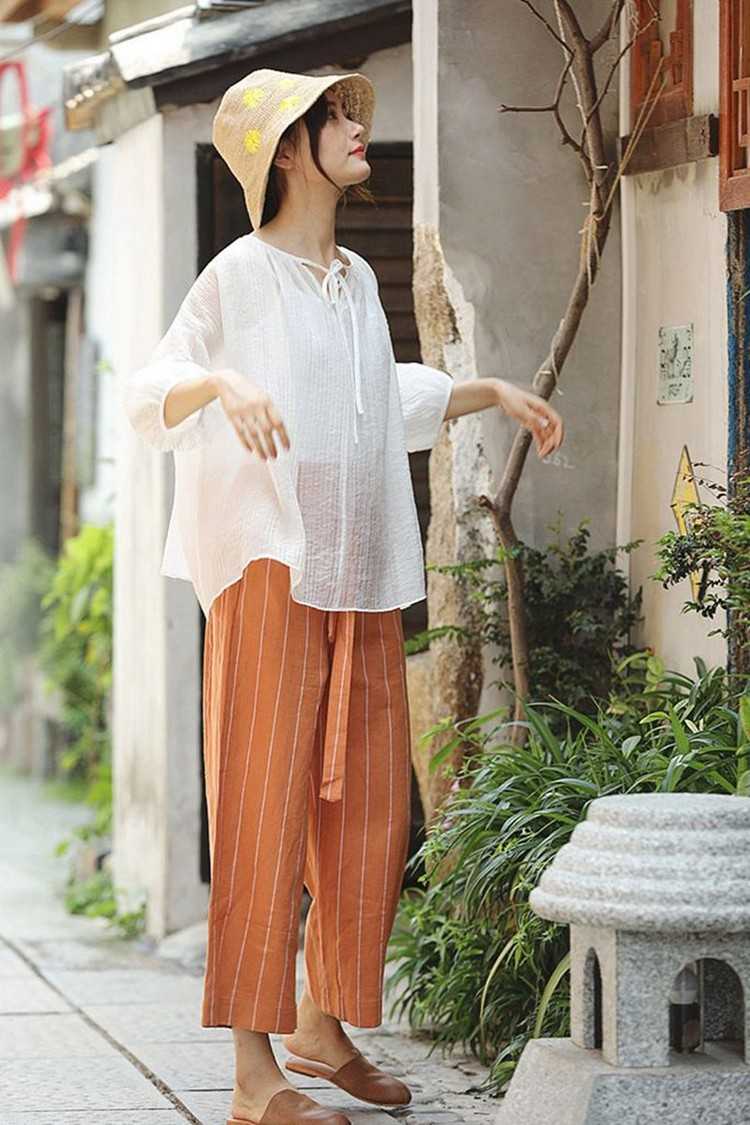 Široké nohavice kombinujú ľanové nohavicové súpravy na leto