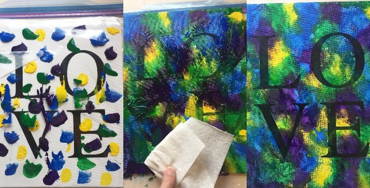 Maliarske plátno s detskými rozmazanými farbami papierovou utierkou