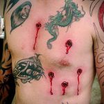 татуировка за мъже # 314 е готина версия на модела, която може успешно да се използва за обработка и нанасяне като татуировка на гърба за мъже