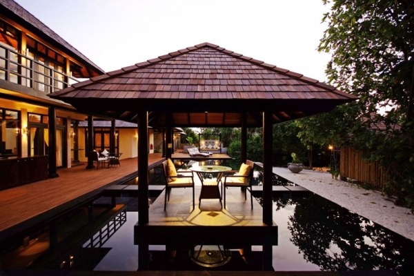 exotický exteriér luxusný hotel dizajn drevo prírodné materiály dom exteriér súkromný ostrov luxusný hotel drevo prírodné materiály exteriér