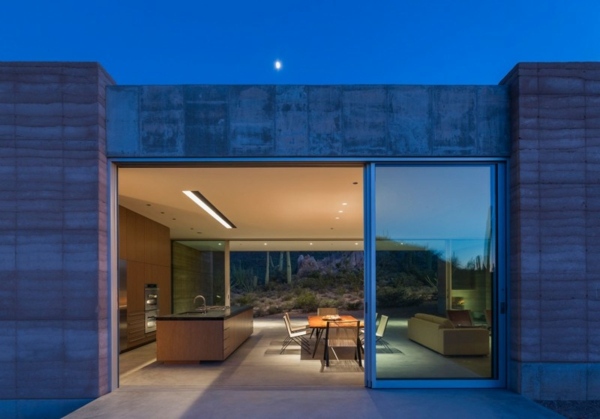 Objemové sklenené posuvné dvere do obývačky Objemová obývacia izba so sklenenými posuvnými dverami