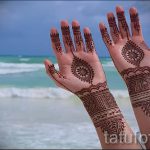 mehendi sur son bras comme un гривна - une photo de tatouage au henné temporaire 1165 tatufoto.ru