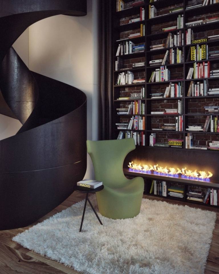 Pohodlná stolička na čítanie v zelenej farbe moderný slinkový stenový dizajn krbová knižnica kreslo zelené minimalistické